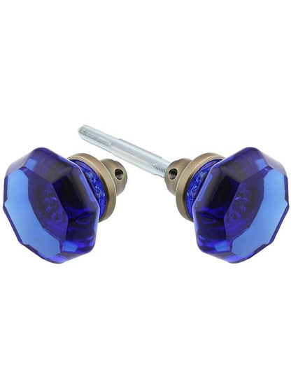 Pair of Cobalt Blue Octagonal Crystal Glass Door Knobs in Antique Brass.